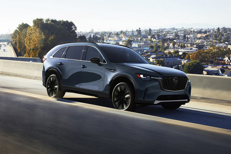 Mazda CX-90 Turbo Sport driving on a highway