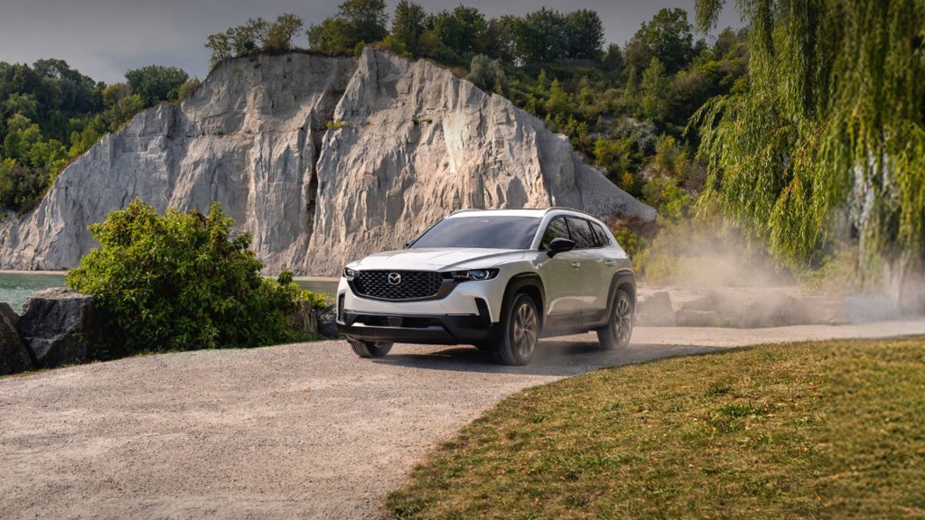 white 2026 Mazda CX-50 Hybrid in mountians