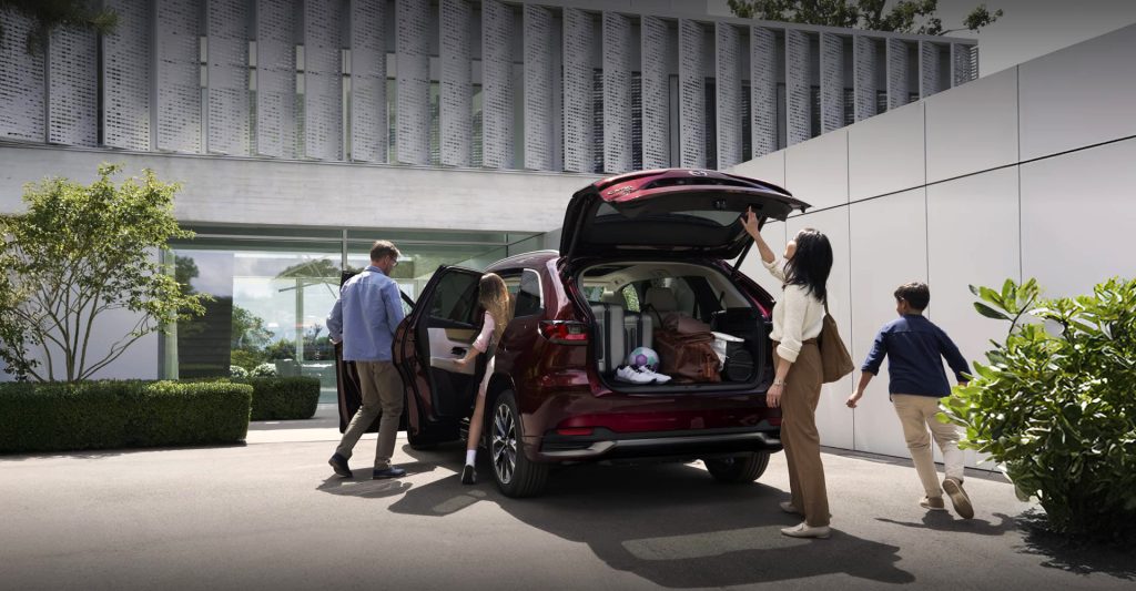 Red Mazda CX-90 a Family car