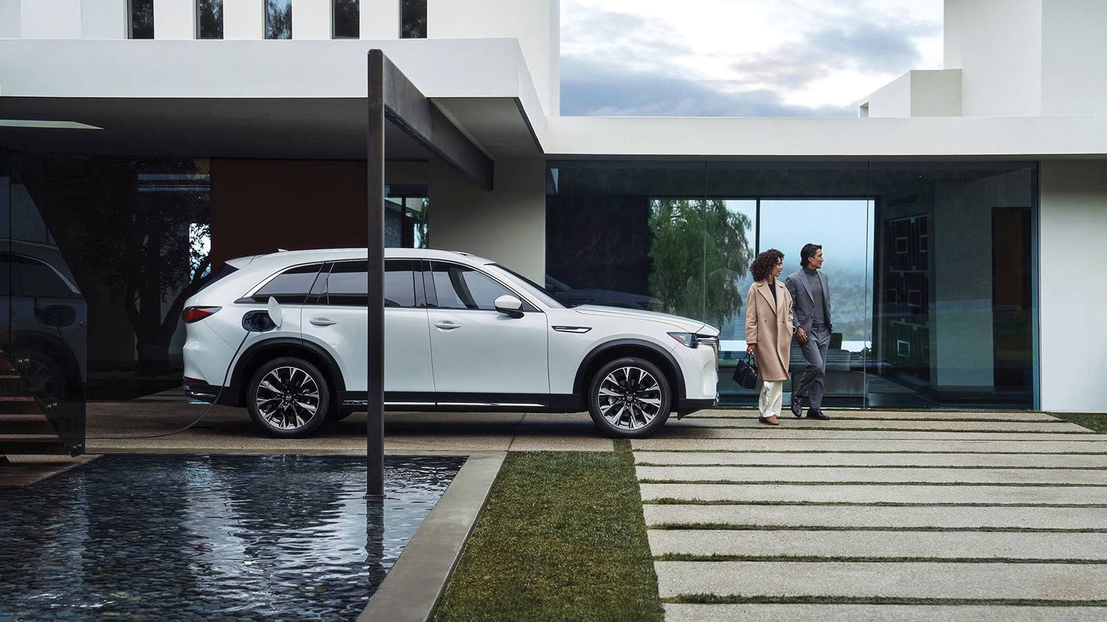 Mazda CX-90 PHEV parked in the driveway