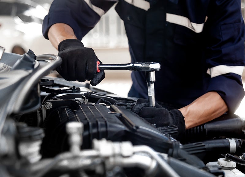 A technician while servicing a car